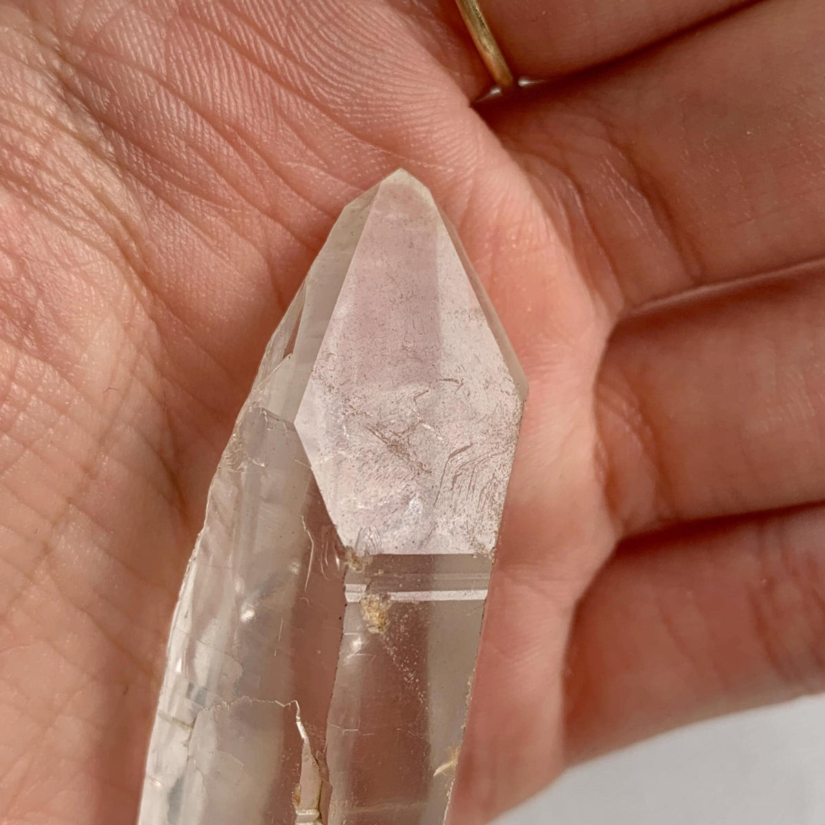 Clear quartz crystal point with distinct Isis face geometry
