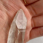Clear quartz crystal point with distinct Isis face geometry