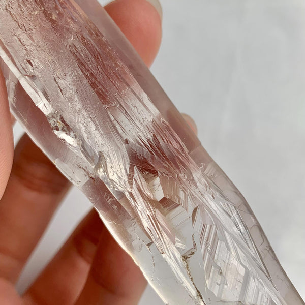 Close up of ribbed Lemurian Quartz crystal surface details
