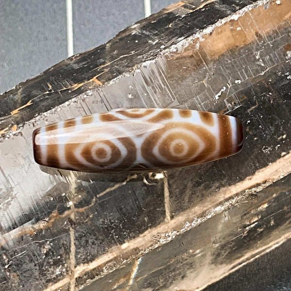 Minimalist mens spiritual protection featuring a genuine agate dragon eye amulet