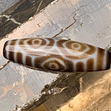 Rare Tibetan dragon eye dzi bead with sharp black and white circular patterns