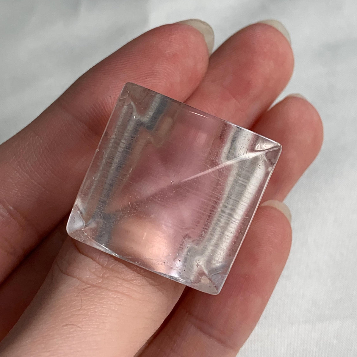 Bold sculptural clear quartz ring with wide band