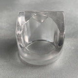 Wide band statement ring showcasing a large pyramid crystal design