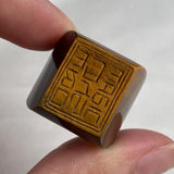 Wide band tiger eye ring hand carved from solid stone
