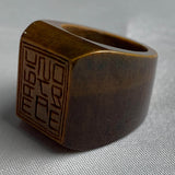 Large square tiger eye ring carved from a single piece of stone