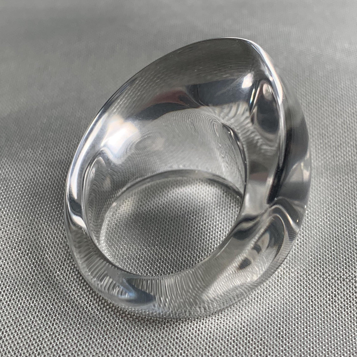 Handmade clear quartz ring with curved architectural design