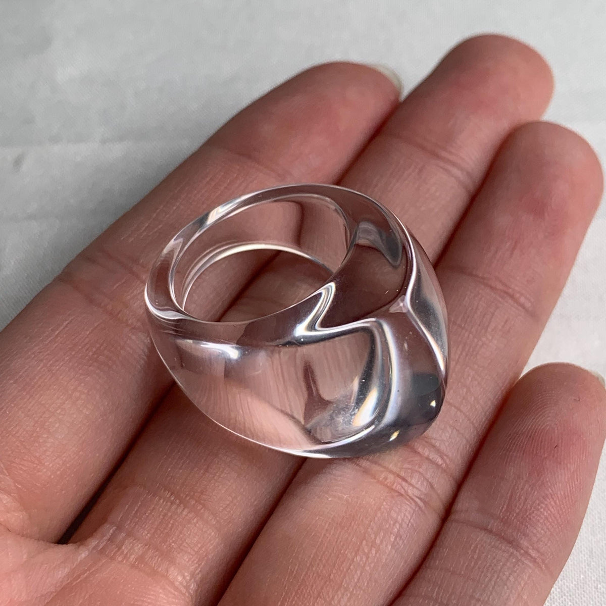 Clear quartz curved point statement ring hand carved from solid stone