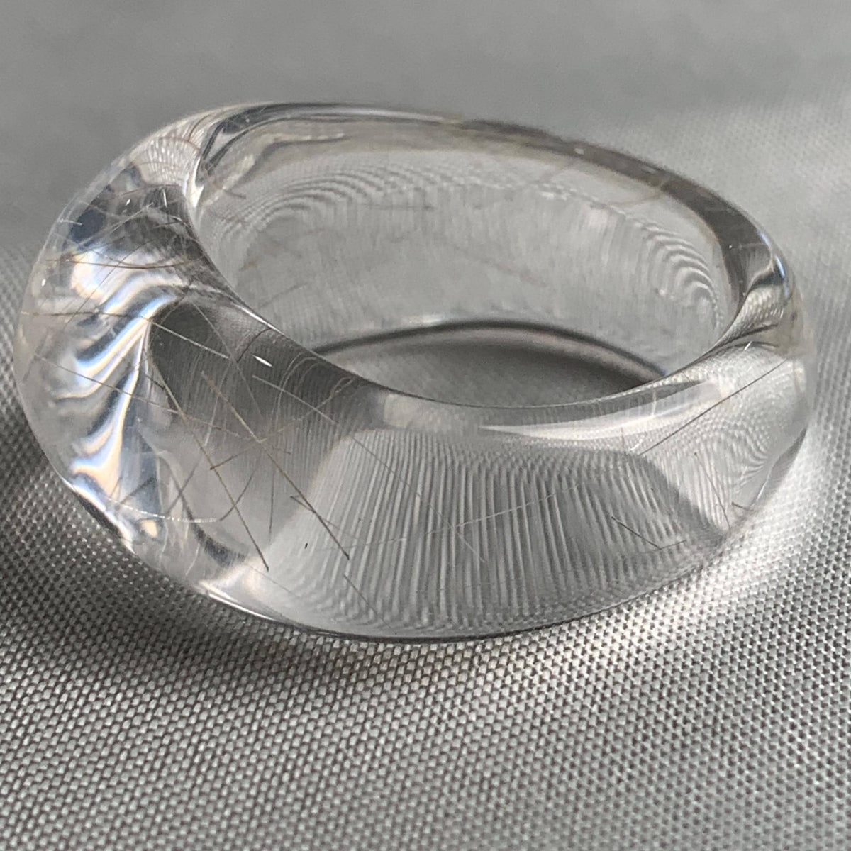 Large dome gemstone ring carved from silver rutilated quartz