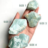 Collection of natural aquamarine stones available in multiple size options (labels)
