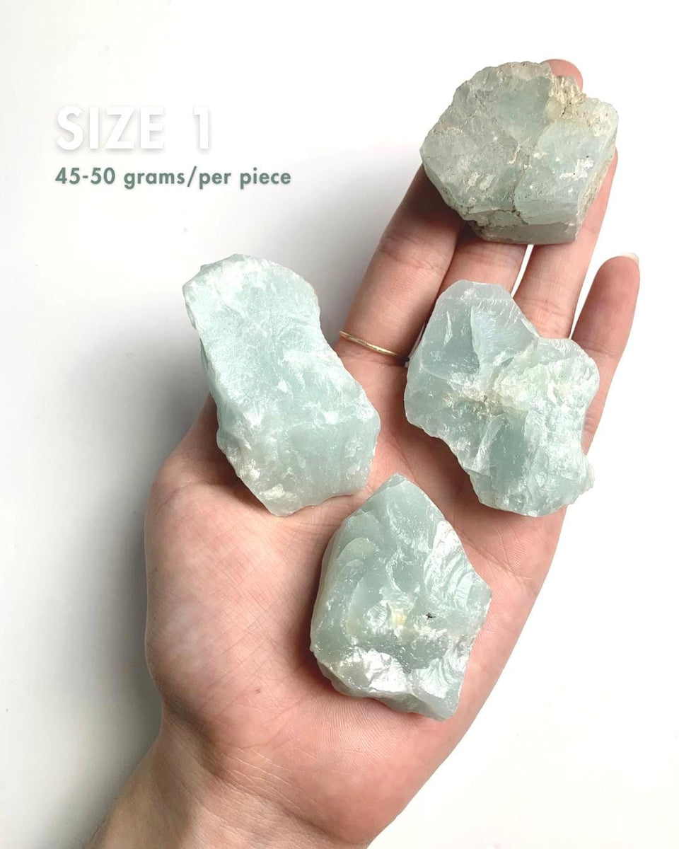 Close up of genuine raw aquamarine mineral specimen showing crystal formation, size 1