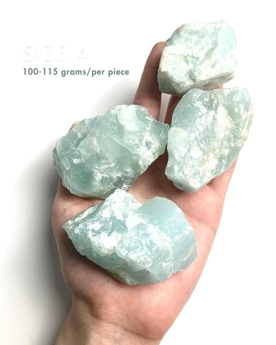 Close up of genuine raw aquamarine mineral specimen showing crystal formation, size 4