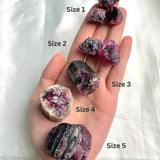 Collection of genuine pink tourmaline stones available in multiple size categories
