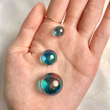 Blue iridescent crystal sphere