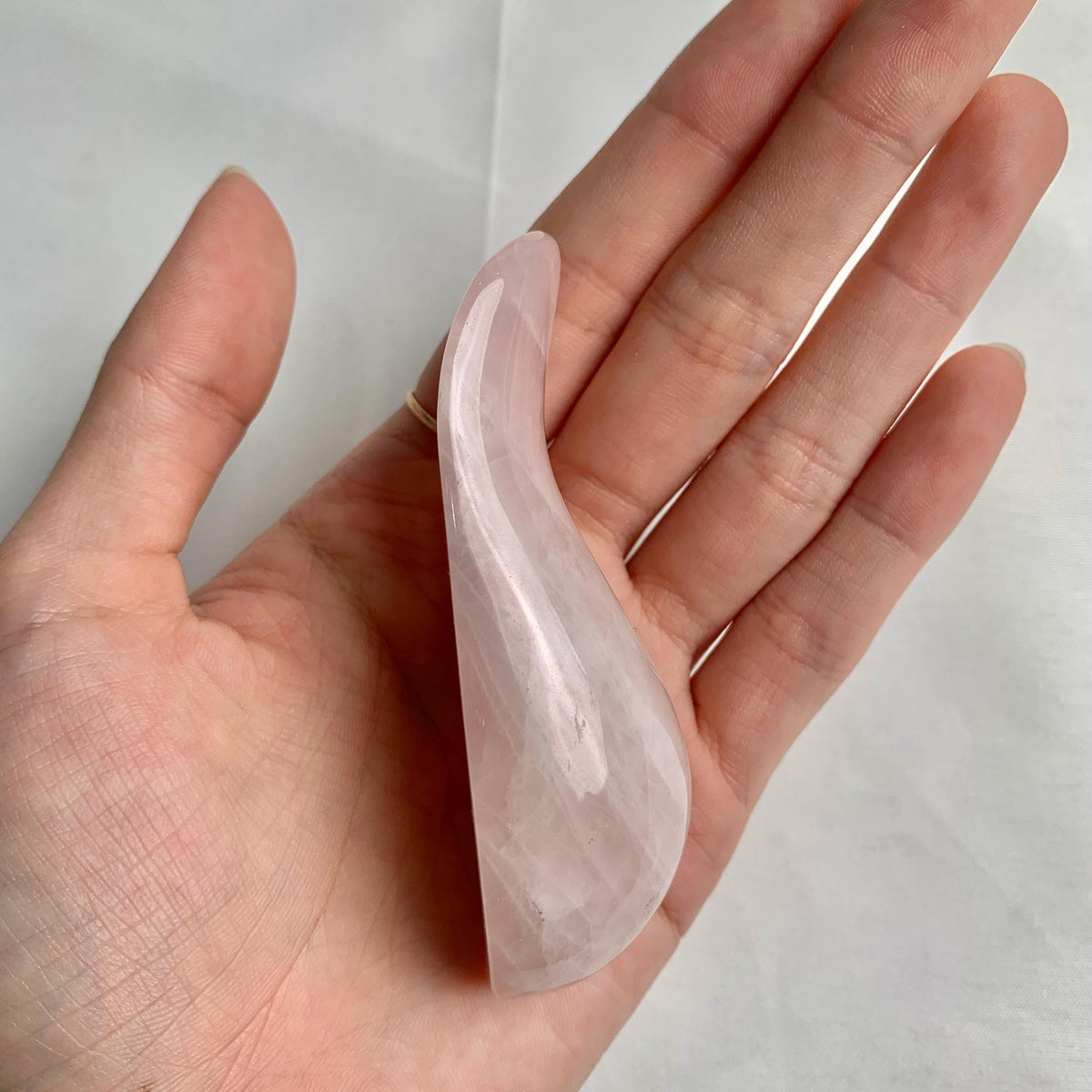Natural rose quartz curved acupressure tool