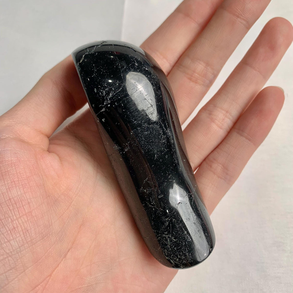 Smooth polished black crystal wand