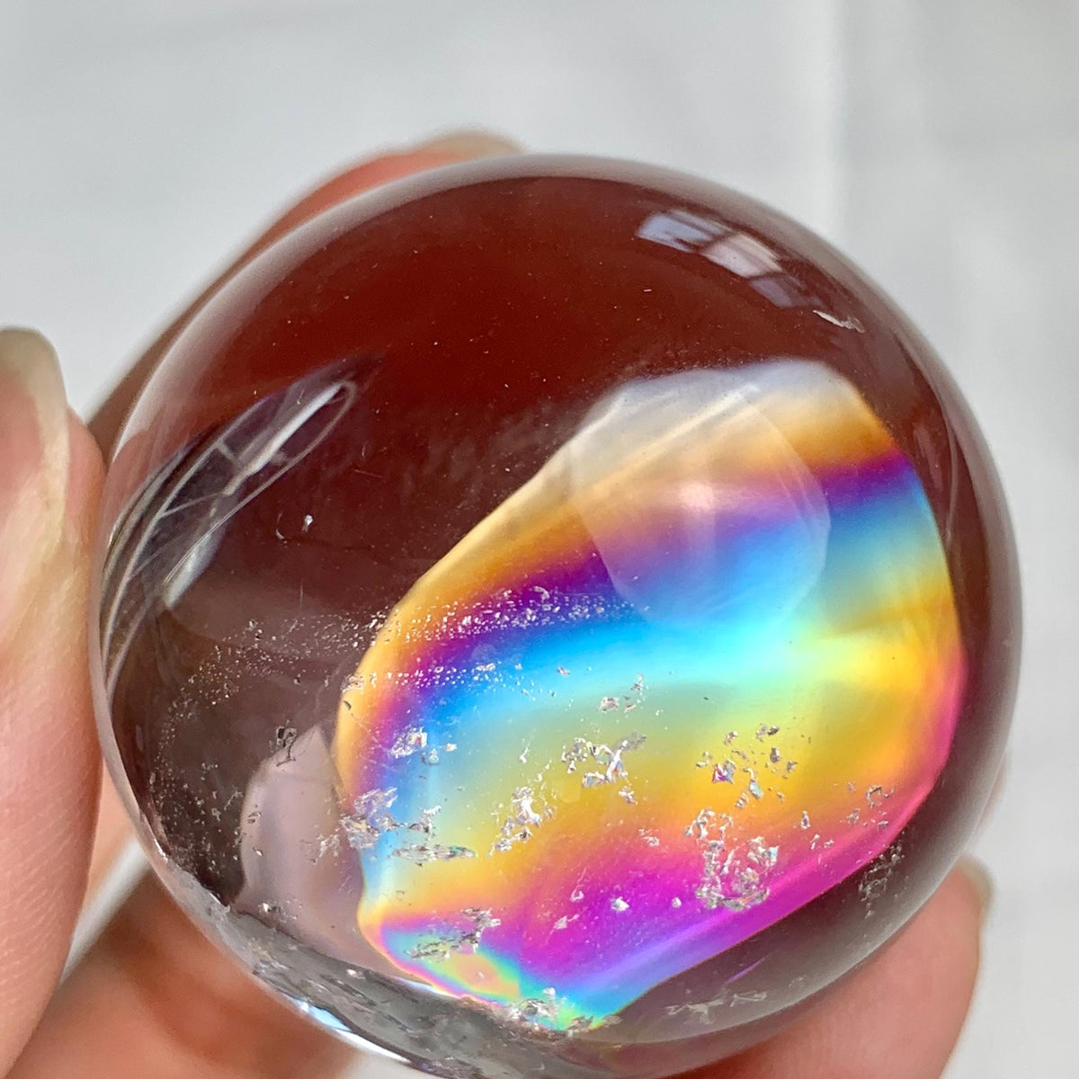 38mm rainbow quartz sphere displayed as a decorative crystal piece with strong internal rainbows