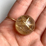21mm polished quartz crystal ball with prominent rutile threads
