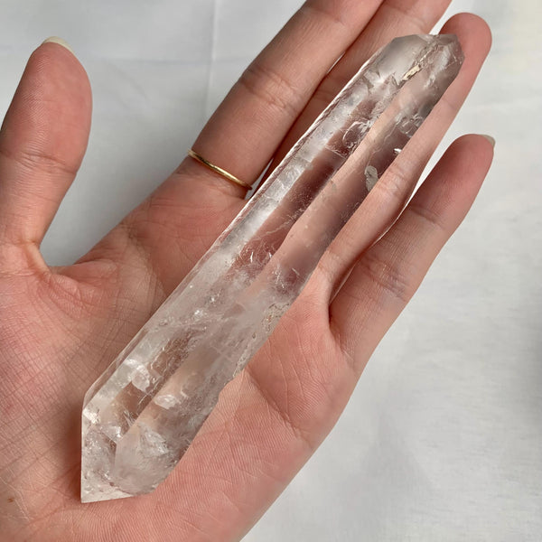 Double terminated Lemurian Quartz crystal with natural points on both ends