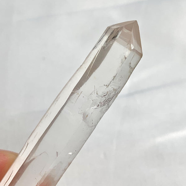 Minimalist clear quartz point with elongated structure