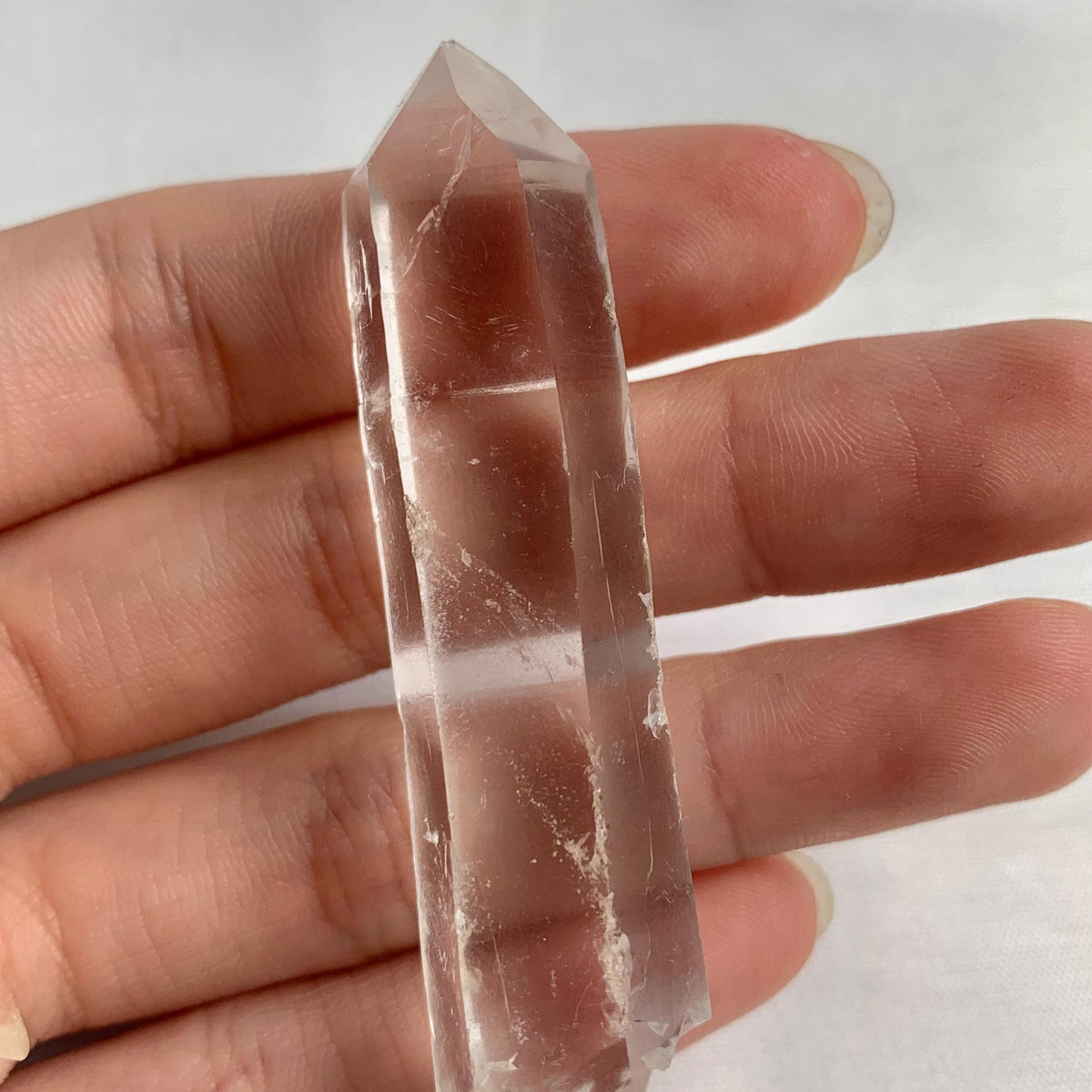 Small high clarity Lemurian Quartz crystal point