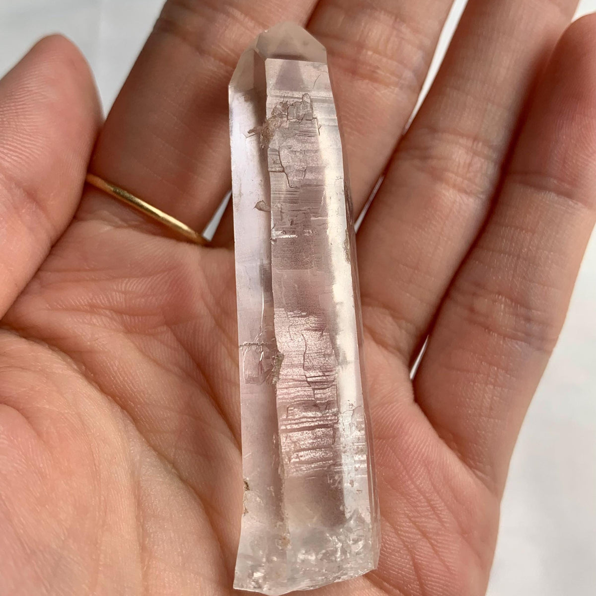 Natural Lemurian Quartz crystal suitable for pocket use