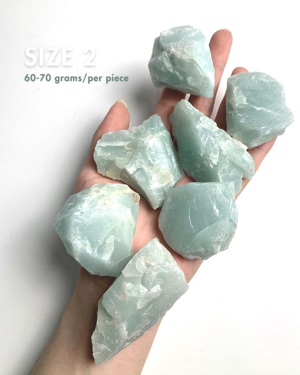 Close up of genuine raw aquamarine mineral specimen showing crystal formation, size 2
