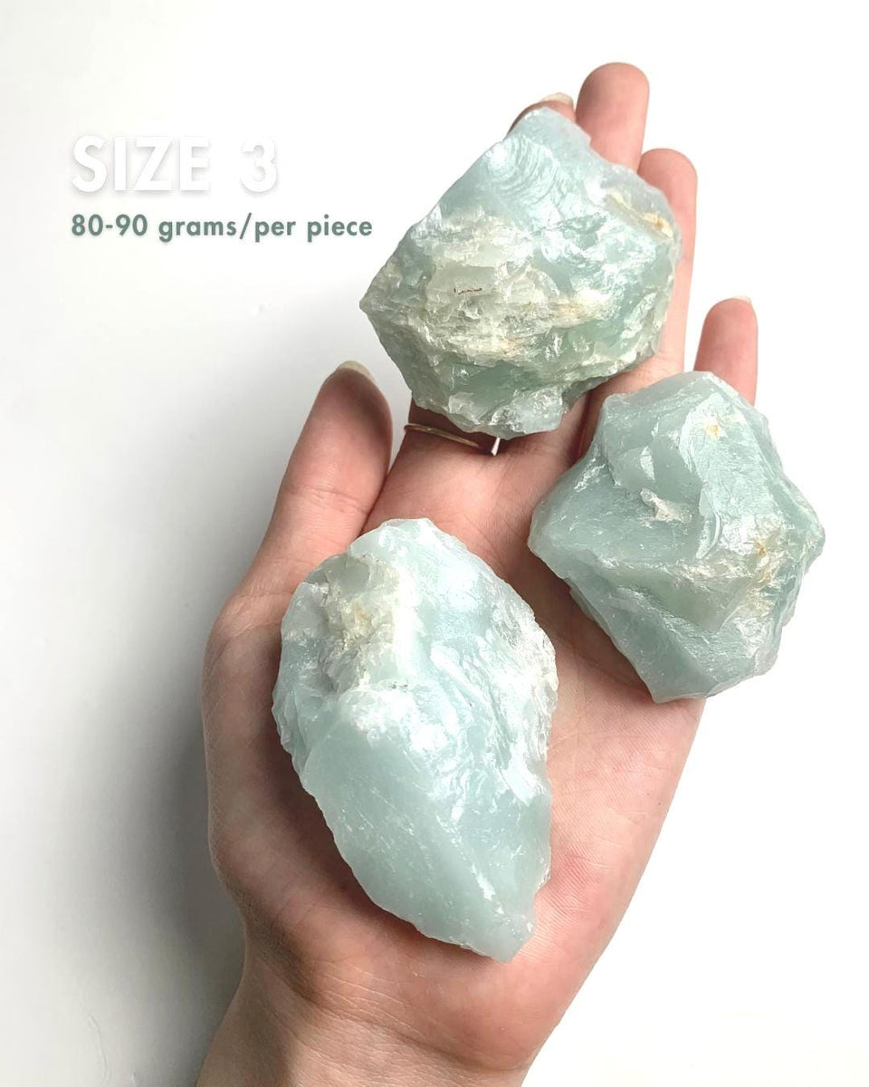 Close up of genuine raw aquamarine mineral specimen showing crystal formation, size 3