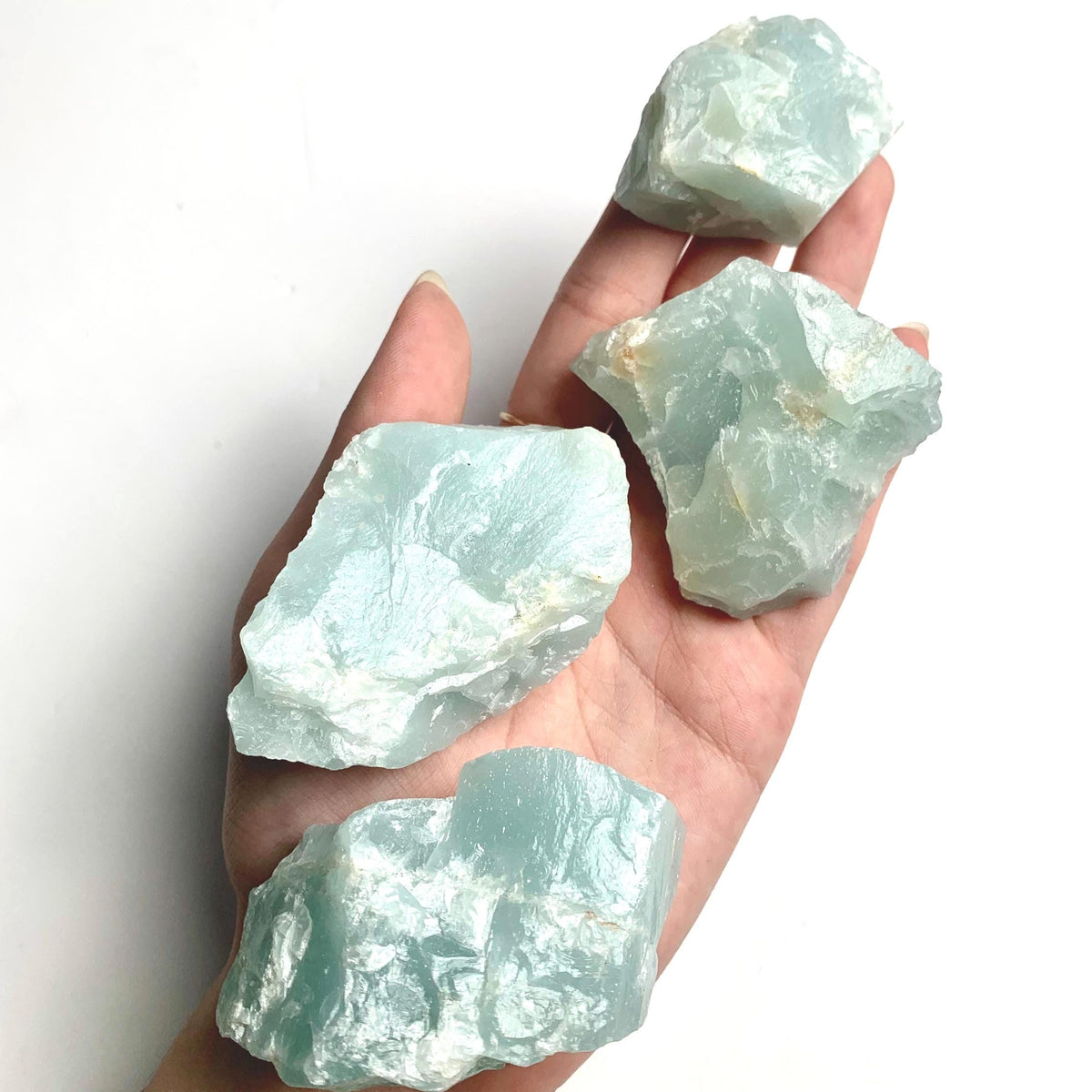 Collection of natural aquamarine stones available in multiple size options