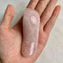 Polished rose quartz reflexology stone