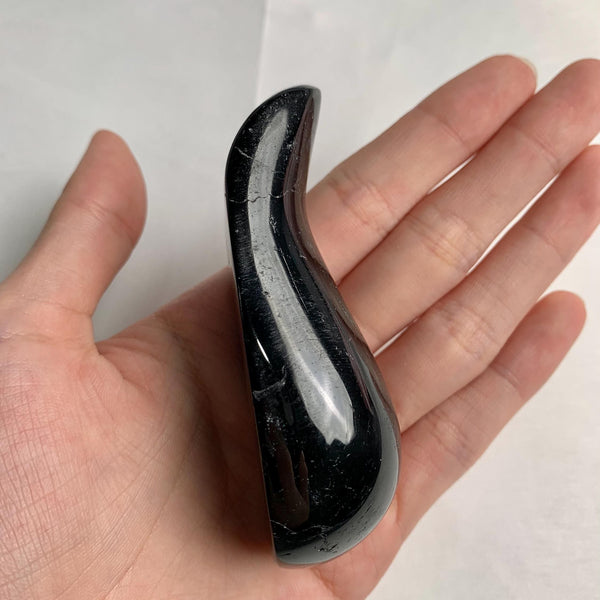 Grounding black tourmaline wand close up