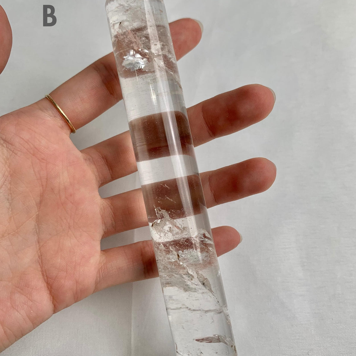 Large polished crystal healing tool