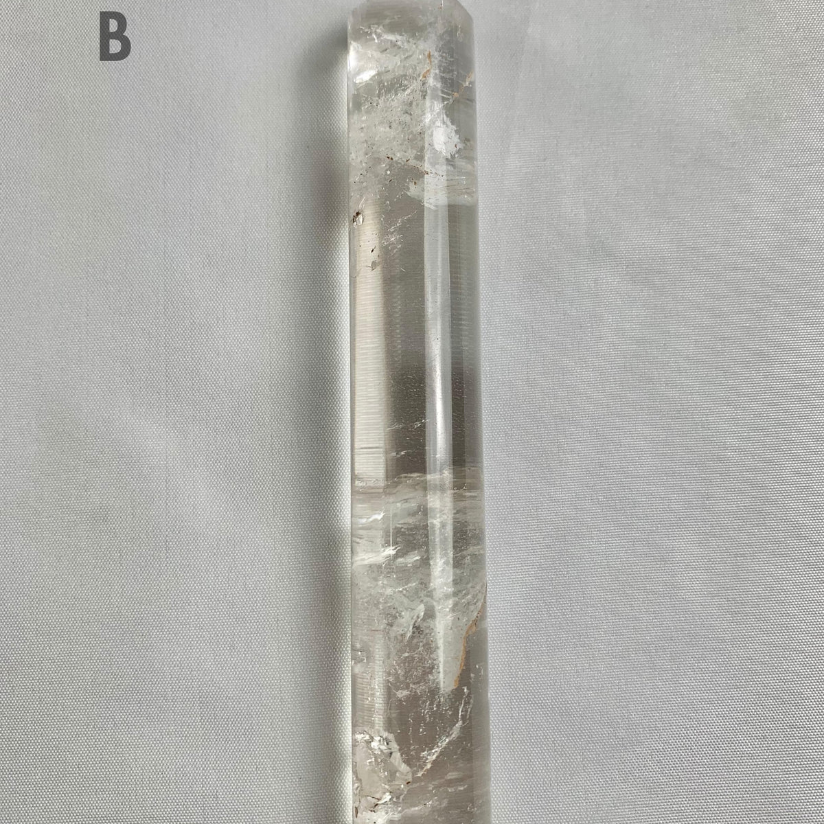 Handheld clear quartz wand