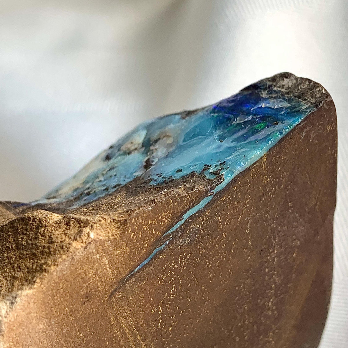Close up of raw opal mineral specimen for collectors