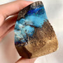 Boulder opal display piece showing colorful opal veins