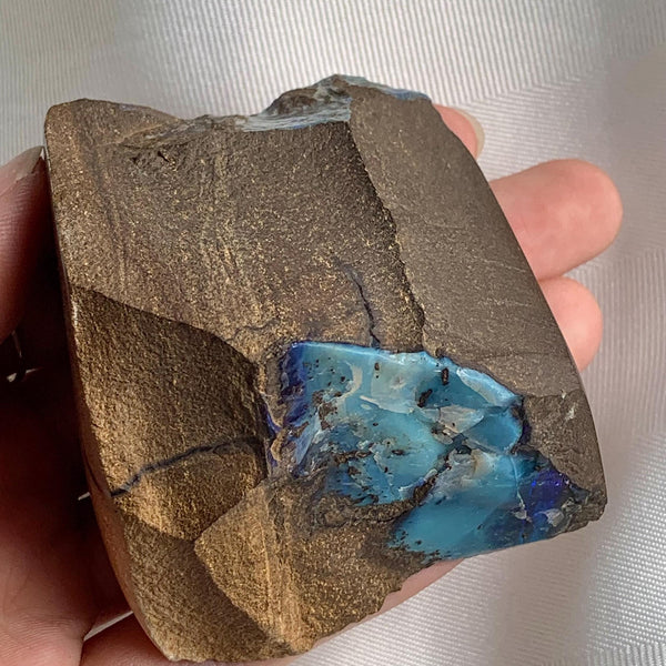 Natural Australian opal specimen in ironstone host rock