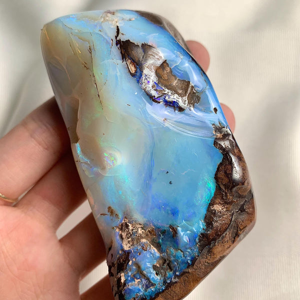 Australian boulder opal with iridescent colours