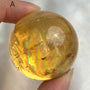 Golden calcite sphere collector specimen