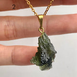 Rare green moldavite necklace for crystal collectors and enthusiasts