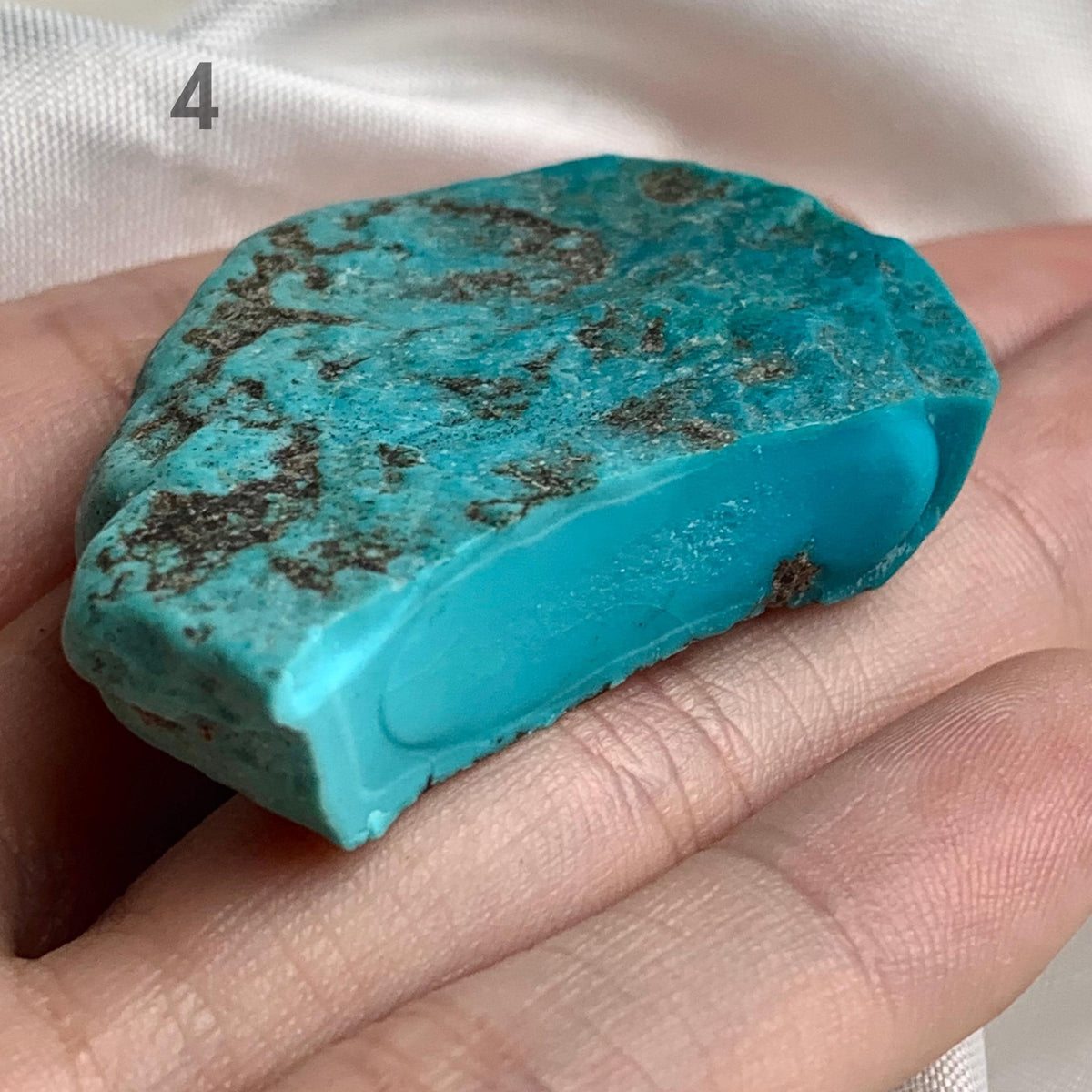 Premium turquoise rough with minimal matrix inclusions