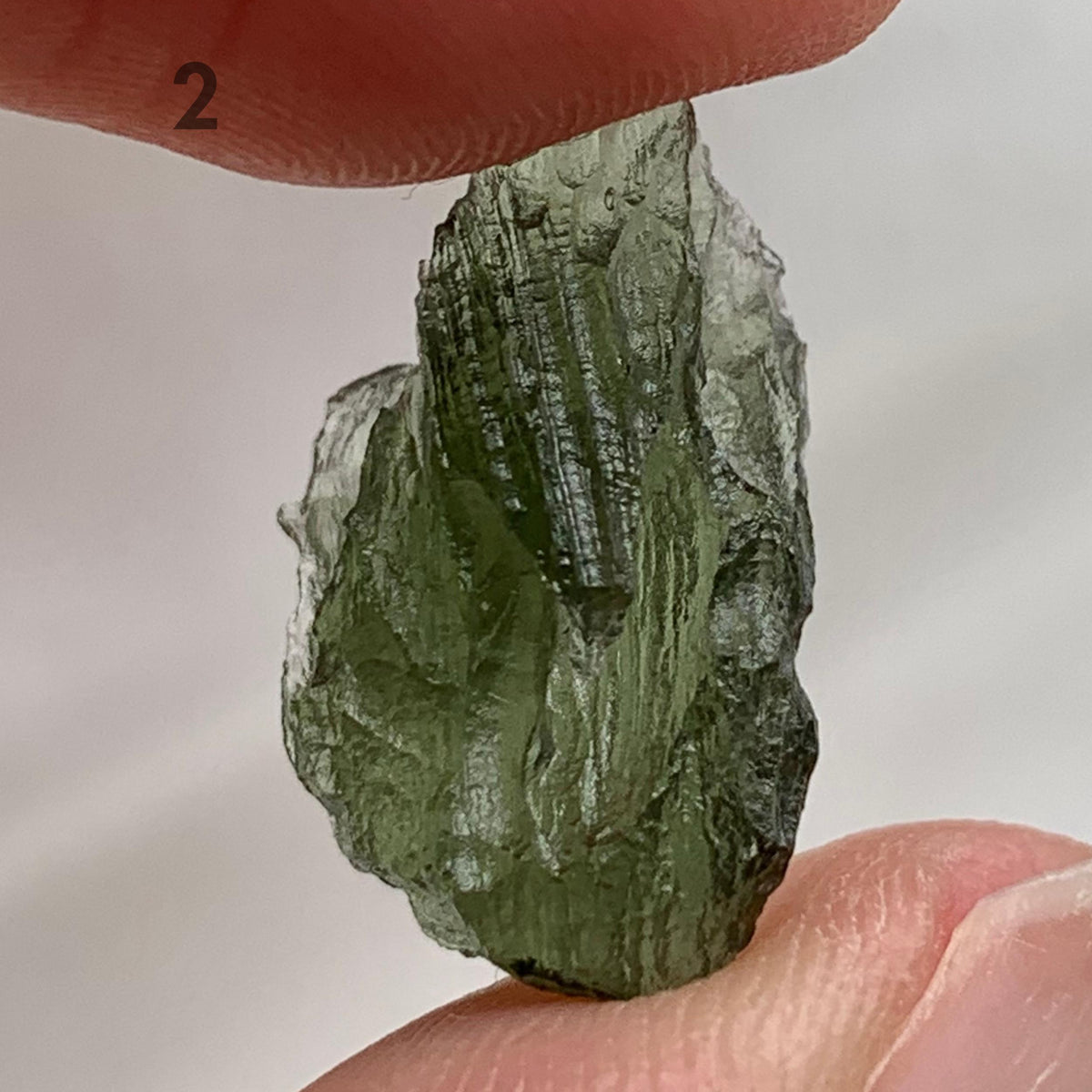 Small raw Moldavite crystal for pocket collection
