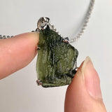 Raw authentic moldavite necklace on silver chain from Czech Republic