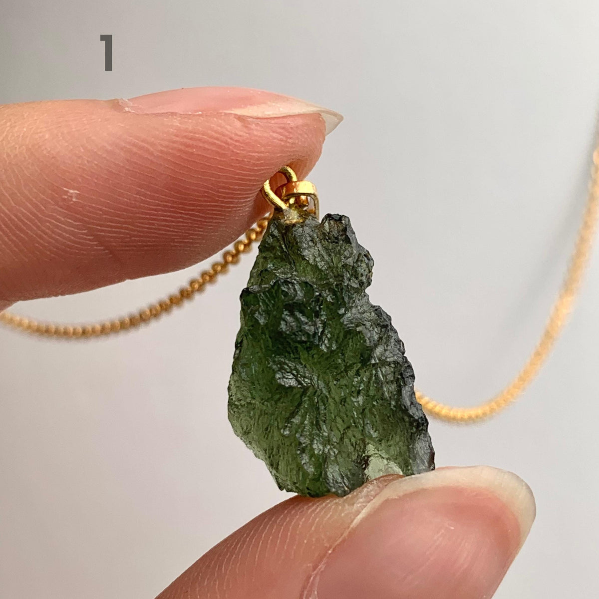 Rare raw moldavite crystal pendant from Czech Republic