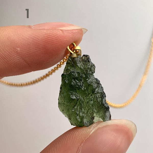Rare raw moldavite crystal pendant from Czech Republic