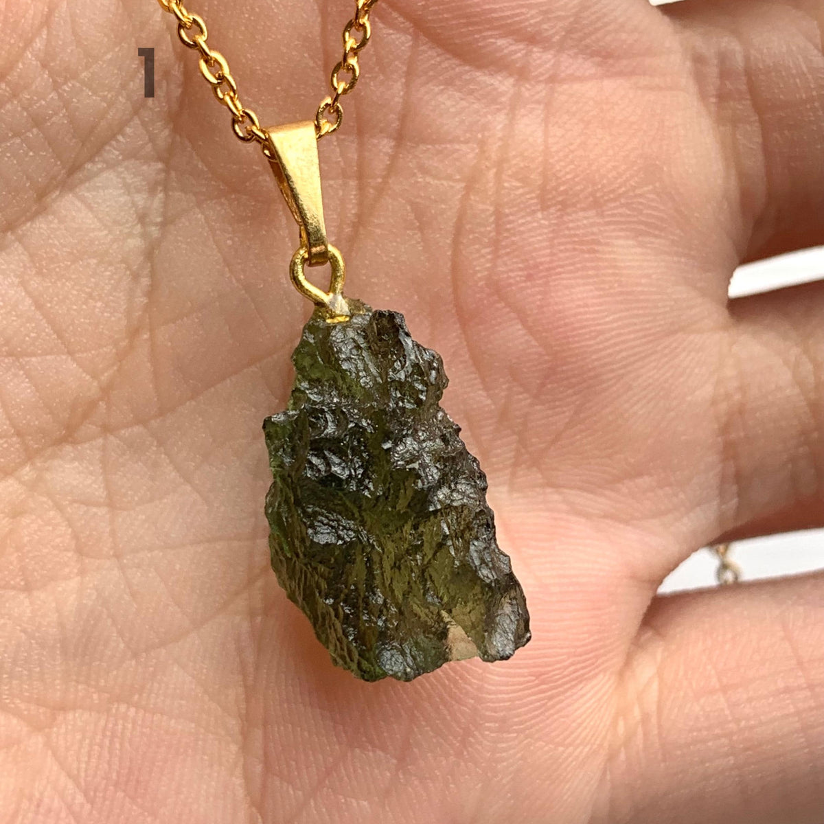 Raw authentic moldavite pendant necklace with natural texture