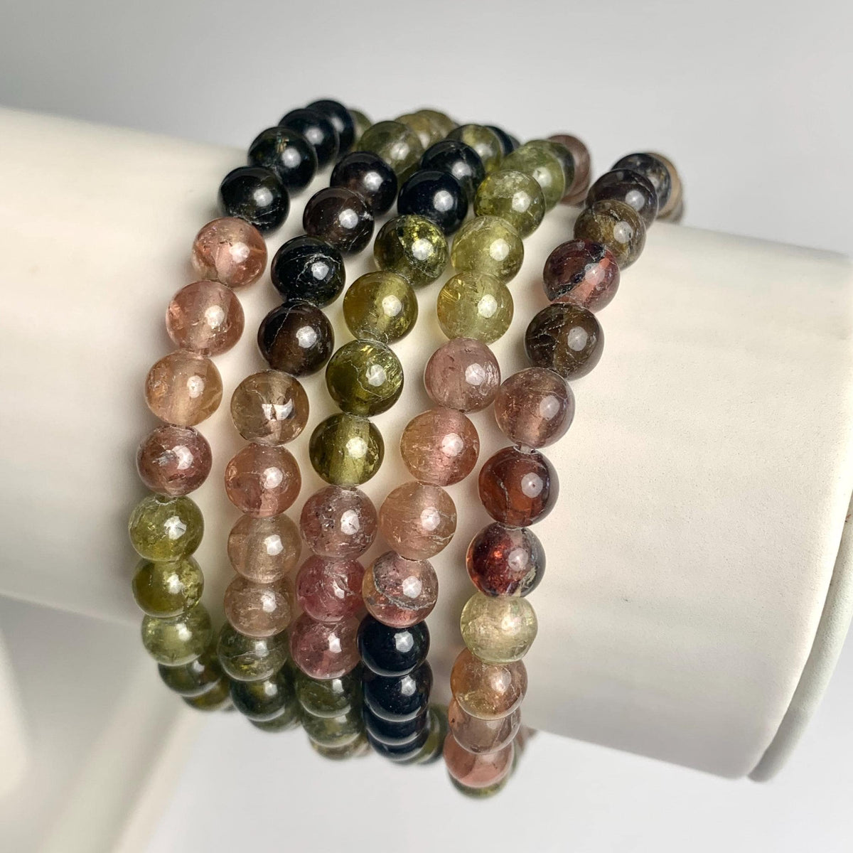 6mm natural tourmaline beads arranged into a colorful crystal bracelet
