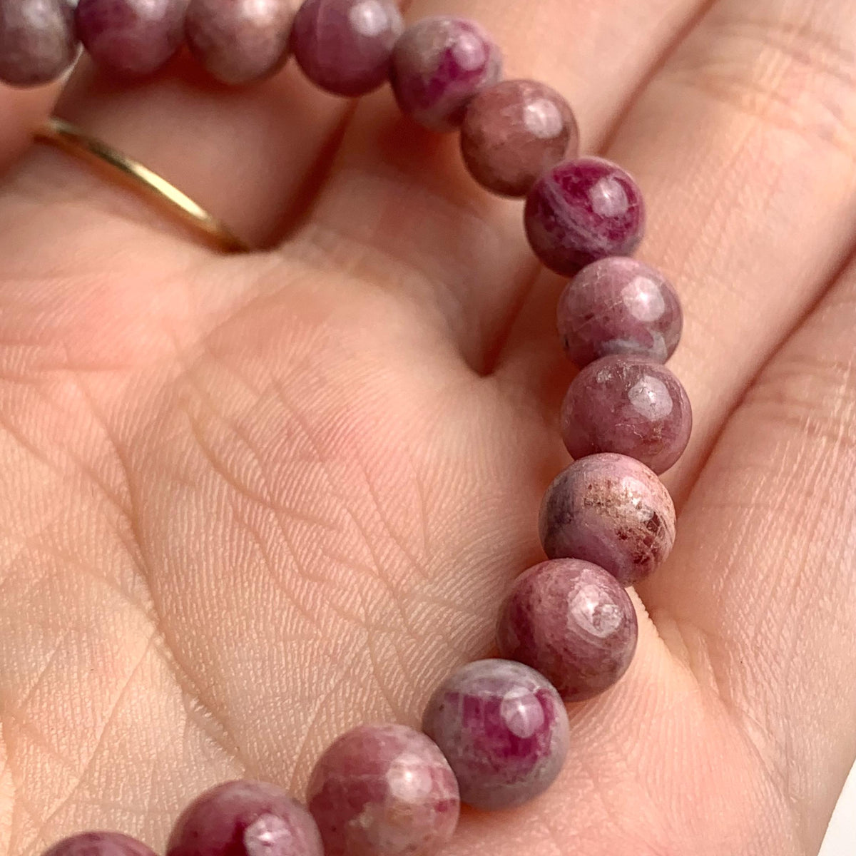 Handmade gemstone beaded bracelet featuring natural tourmaline stones