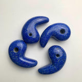 Traditional magatama-shaped Lapis Lazuli crystal pendant in deep blue.