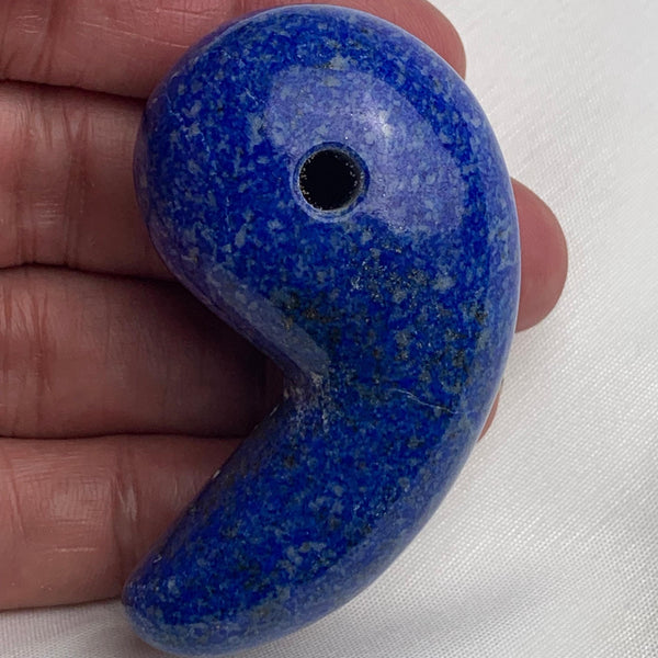 Natural polished Lapis Lazuli magatama suitable for collecting and display,