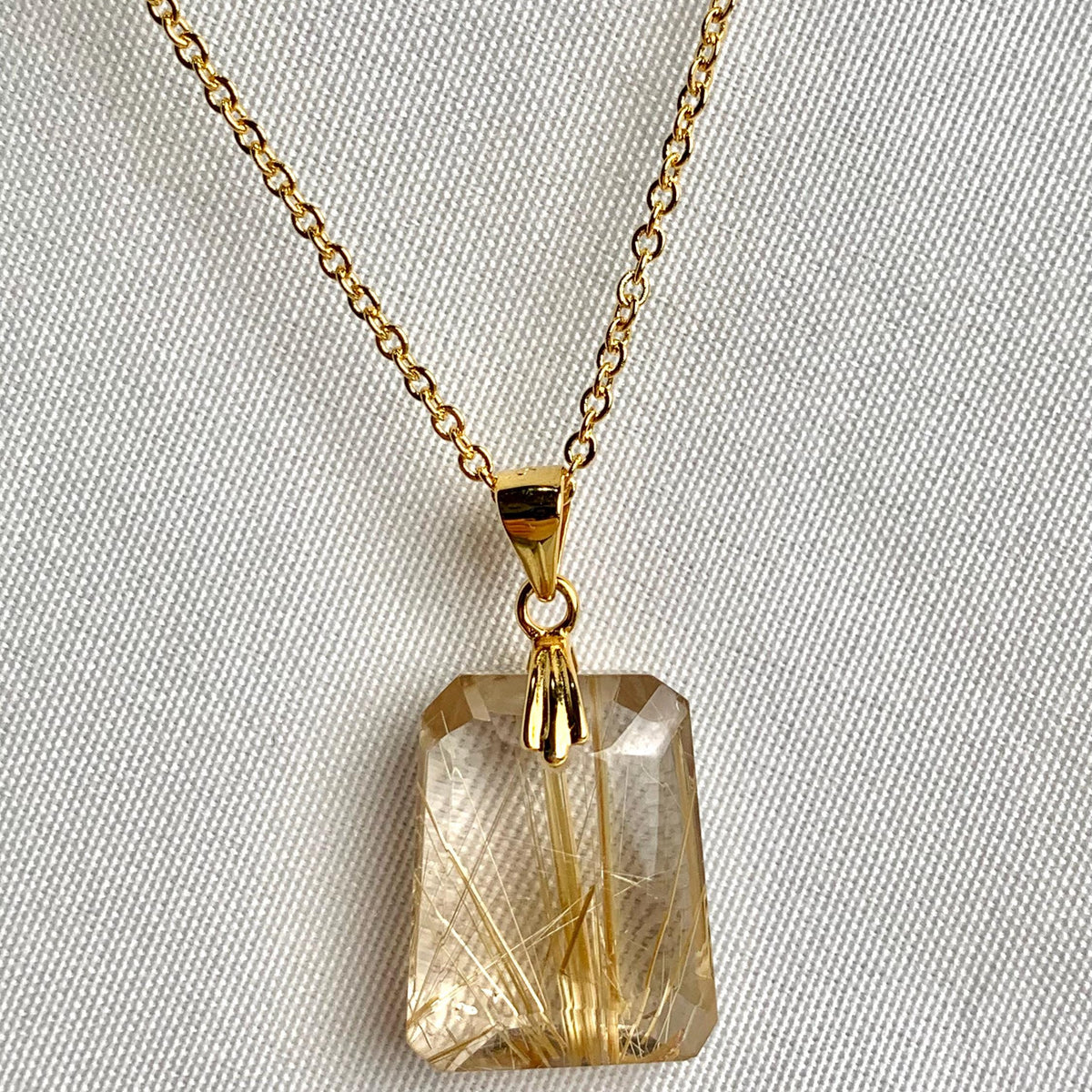 Elegant AAAA Rutilated Quartz gemstone necklace with natural inclusions