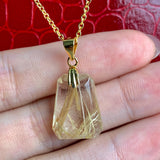High-clarity natural Rutilated Quartz pendant in sterling silver